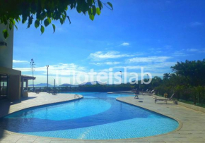 C148 Lindo apartamento em condomínio de frente para o mar